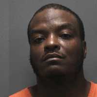 Feds: Impatient Repeat Felon Points Police To Smuggled Gun, Drugs