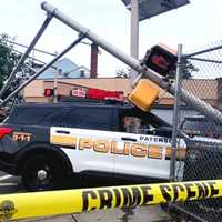 Paterson Police Cars Collide, Topple Traffic Light