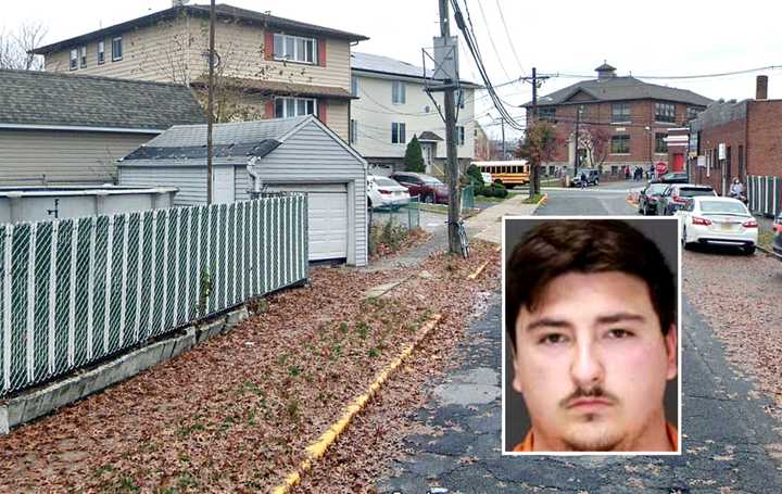 Damien Imbriano lives in the two-family house at left, near the McKenzie School (right) in East Rutherford.