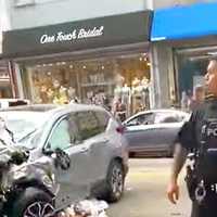 Prosecutor: Speeding SUV Kills One, Injures Others, Hits Parked Police Car In Downtown Paterson