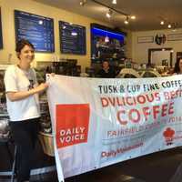 <p>Tusk &amp; Cup in Ridgefield, Conn. proudly displays its DVLicious banner for wining best coffee in Fairfield County.</p>