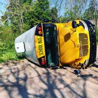 <p>The school bus on its side.</p>