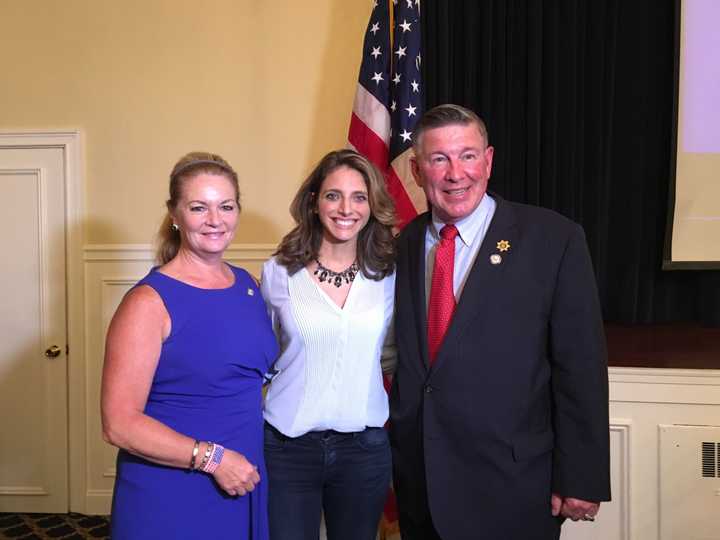 Putnam County citizens and officials gathered at a town meeting hosted by the American Security Council. Putnam County Sheriff Donald B. Smith is shown with County Executive MaryEllen Odell and Janine Stange.