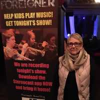 <p>Community Advisor Leslie Hatzel outside the Capitol Theatre where she saw Foreigner on Feb. 13.</p>