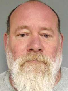 Authorities: Norwood Man Assaults Mom, 83, Fights Police After Crashing Stolen Dump Truck