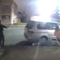 <p>Everett Rand lay face down on the curb next to a minivan following the shooting in Newark this past May.</p>