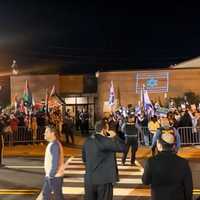 <p>The sides were separated outside the Englewood City Council meeting.</p>