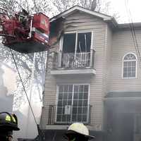 <p>Firefighters prevented more serious damage to the neighboring home.</p>