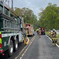 <p>Firemen at the scene of the April 27 fuel truck spill in Bucks County.</p>