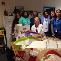 Visiting Nurses Distribute Holiday Gift Baskets To Patients