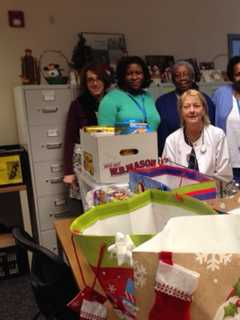 Visiting Nurses Distribute Holiday Gift Baskets To Patients