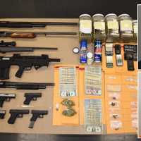 <p>Contraband seized by authorities in Chester County. Inset: Rodney “Gaff” Gaffney, 31, and Rahshon “Rocky” Rokins, 48, both of Coatesville.</p>