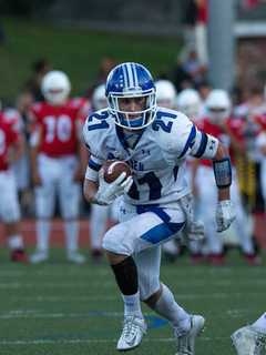 Darien's Grant Rushes Into School's Football Record Book