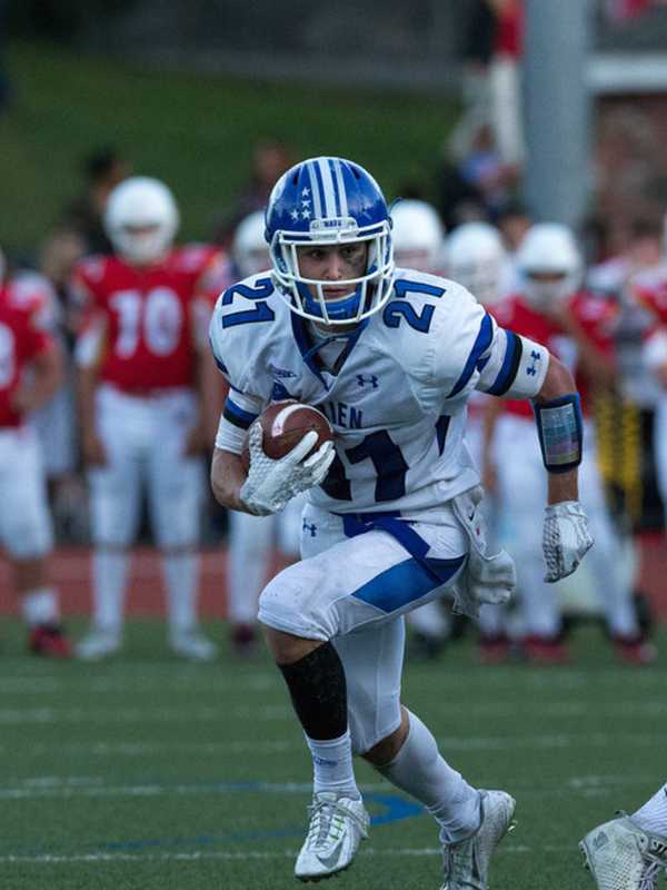 Darien's Grant Rushes Into School's Football Record Book