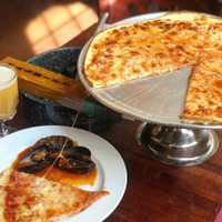 <p>Locals know Grant Street for the thin-crust bar pizza and mussels.</p>