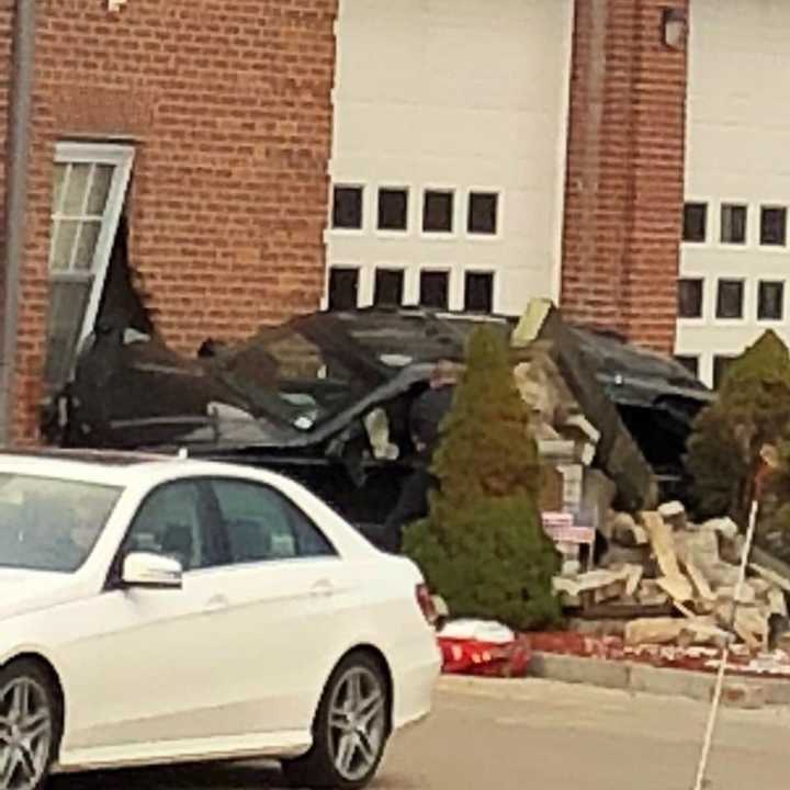 A car crashed into a building in Greenwich on Wednesday morning