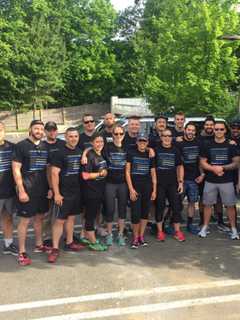 Greenwich Police Officers Carry The Torch For Special Olympics