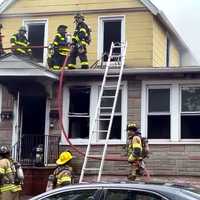 <p>The inner stairs were compromised, forcing firefighters up ladders at the Union Avenue home in North Arlington.</p>