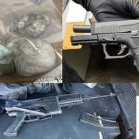 <p>The recovered guns and drugs</p>