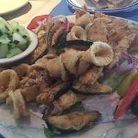 <p>A &quot;pikilia&quot; platter is piled with Mediterranean treats like eggplant, stuffed grape leaves and calamari at Gyro World in Pleasantville.</p>