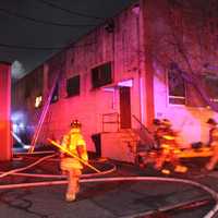 <p>Hackensack firefighters at Wysocki Place blaze.</p>