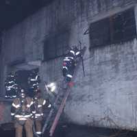 <p>Hackensack firefighters at the Wysocki Place blaze.</p>