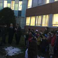 <p>A menorah was lit and songs sung by children from the Chabad Hebrew School in New City Tuesday as County Executive Ed Day and other local officials look on at the Hanukkah ceremony.</p>