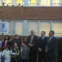 <p>A menorah was lit and songs sung by children from the Chabad Hebrew School in New City Tuesday. County Executive Ed Day and other local officials attend the Hanukkah ceremony.</p>