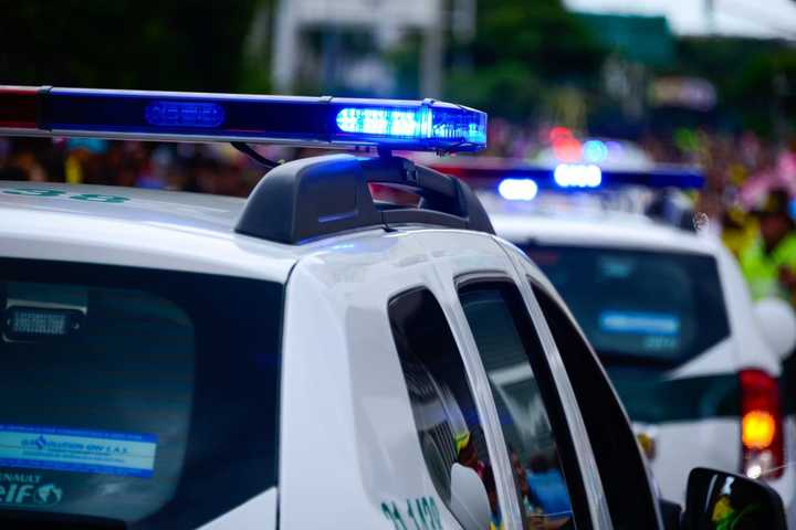 A woman suffered serious injuries in a two-vehicle crash at a busy Long Island intersection.