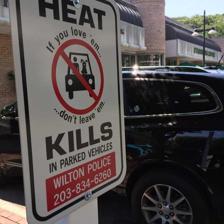 A sign initiative has been started in Wilton to discourage people from leaving children and pets in hot cars.