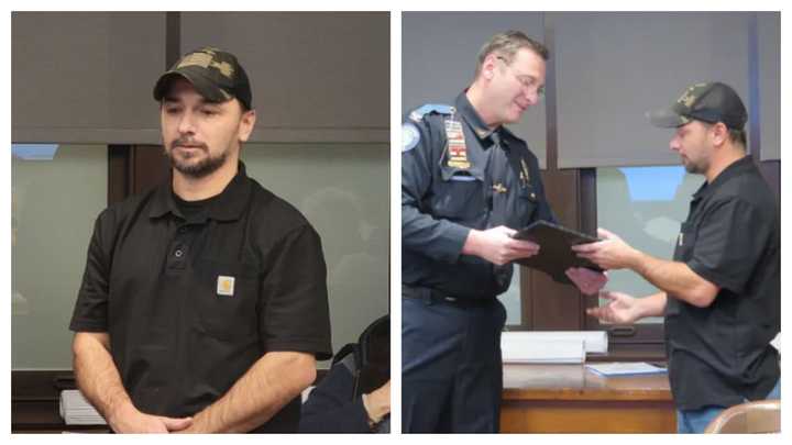 Lee Heckrote receiving the Citizen Service Award from Wyomissing police at the Borough Council meeting on Jan. 9.&nbsp;