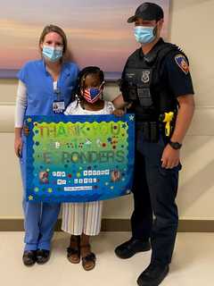 Hero Couple: Off-Duty Cop, Nurse Help Rescue 7-Year-Old At Beach In Fairfield County