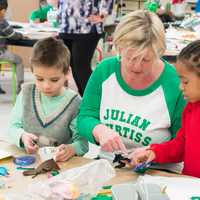 <p>Greenwich Public School art teacher Le Ann Hinkle works with her students.</p>