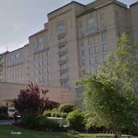 Man Hospitalized After Falling From Hotel Balcony On Long Island