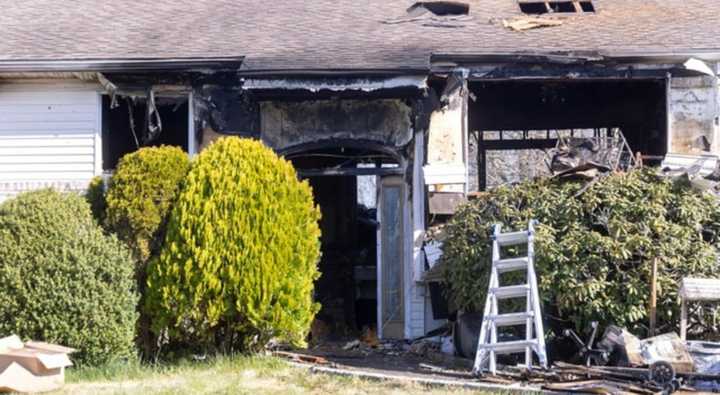 The aftermath of an early morning house fire that damaged a home on Penfield Drive in East Northport Friday, April 22.