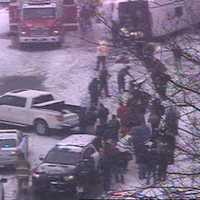 <p>Emergency responders are at work at the scene of an overturned charter bus on I-95 in Madison on Monday afternoon.</p>