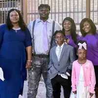 <p>Patrice Huntley and his family.</p>