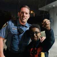 <p>Wayne police officer Steve Martell and Nathan Tedesco, 10.</p>