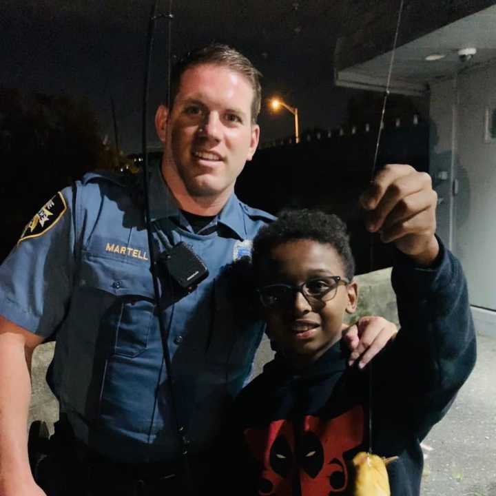 Wayne police officer Steve Martell and Nathan Tedesco, 10.