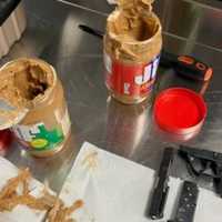 Peanut Butter Pistol Time: Gun Parts Stashed In Jars Of Jif Jam Up JFK Airport Traveler