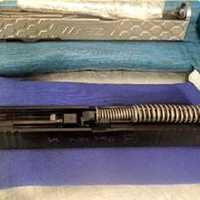 <p>Gun parts hidden in wrist and ankle weights were found by TSA agents at Newark Airport.</p>