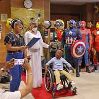 <p>Benjamin Brunson, a second grader at Rebecca M Johnson School, was gifted an accessibility tricycle from Bob &quot;The Bike Man&quot; Charland on Thursday, April 13. Local Police and firefighters dressed up as superheroes for the ceremony.</p>