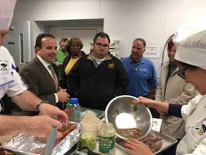 Bridgeport Mayor Joe Ganim joins the ribbon-cutting fun as the Beardsley Zoo opens its new animal commissary.