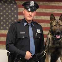 <p>Maywood Police Sgt. Chris Nichols and Ryker.</p>