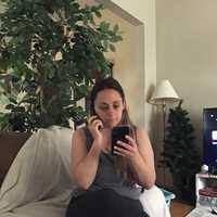 <p>Jenn Polizzano-Demaria on hold with the state Labor Department.</p>