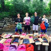 Kids Donate Backpacks To Needly Children In Jamaica