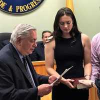 <p>Joined by her children, Sophia and Valentino, new Fairview Councilwoman Violetta Berisha is sworn to office by state Sen. Nicholas Sacco.</p>