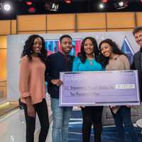 <p>Tanisha Akinloye, her children and Harry Connick Jr. after their recent appearance on the &quot;Harry&quot; show.</p>