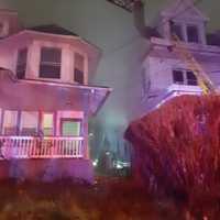 One Dead, One Firefighter Injured In Newark House Fire