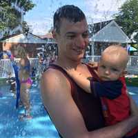 <p>Dave Lease of Rutherford with his 8-month-old nephew, Christopher Mezzina of Waldwick, in Lyndhurst&#x27;s Splash Park.</p>